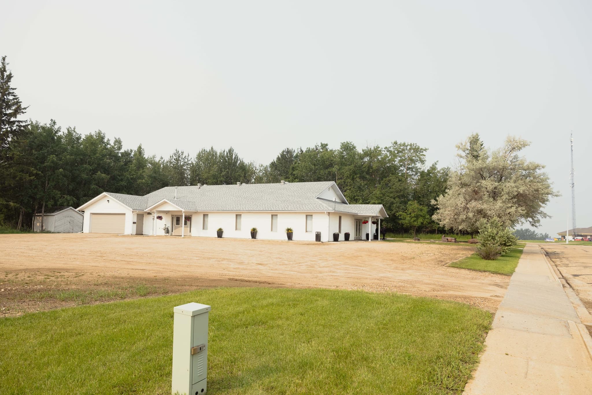 Wide view of the Athabasca Community Chapel building and grounds